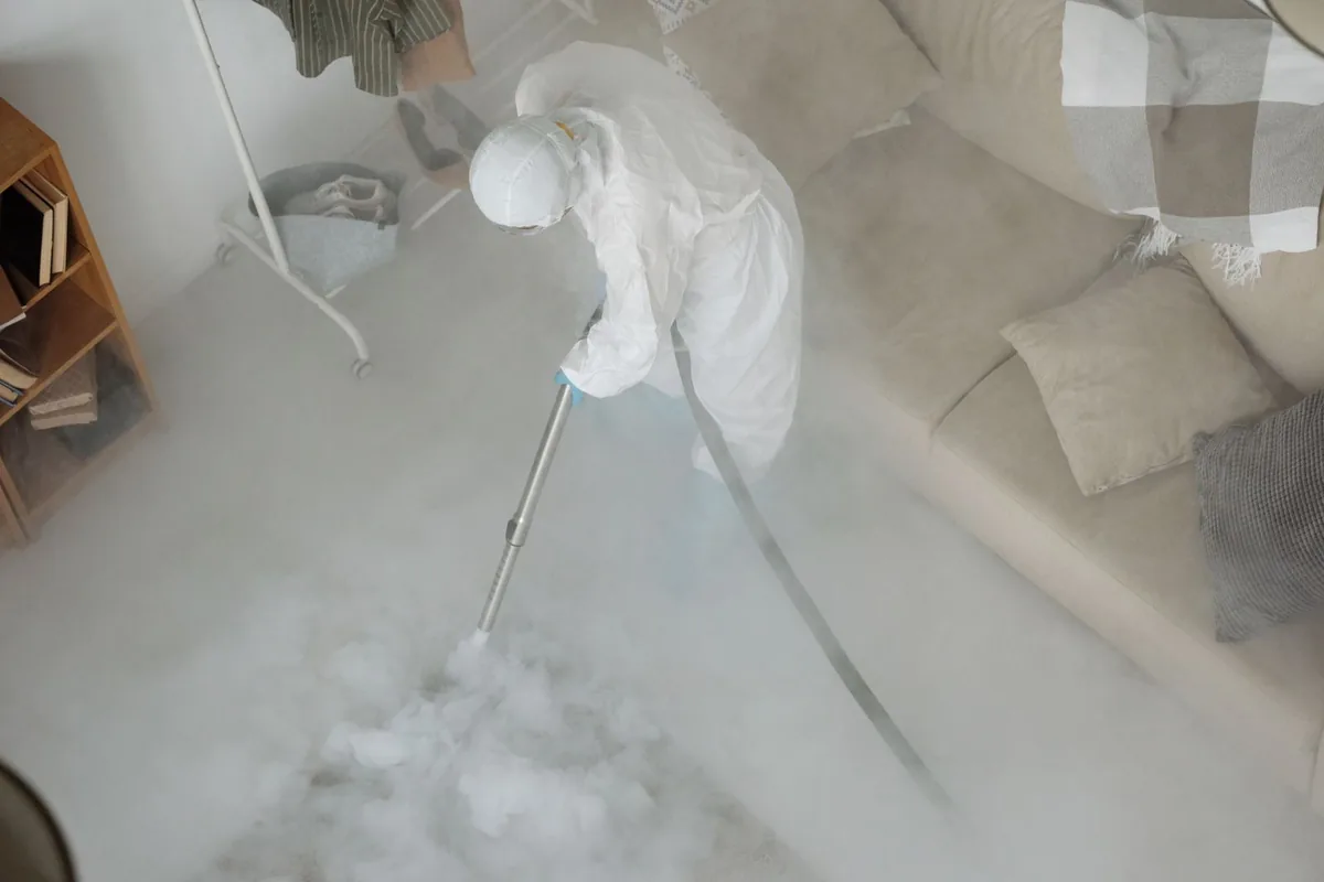 Biohazard cleanup technician in protective equipment, Skippack, PA